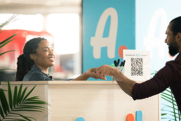 Woman and man at Arity rental counter.