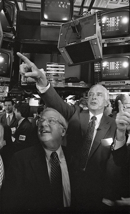 Men on the floor of the NYSE during Allstate's IPO. 