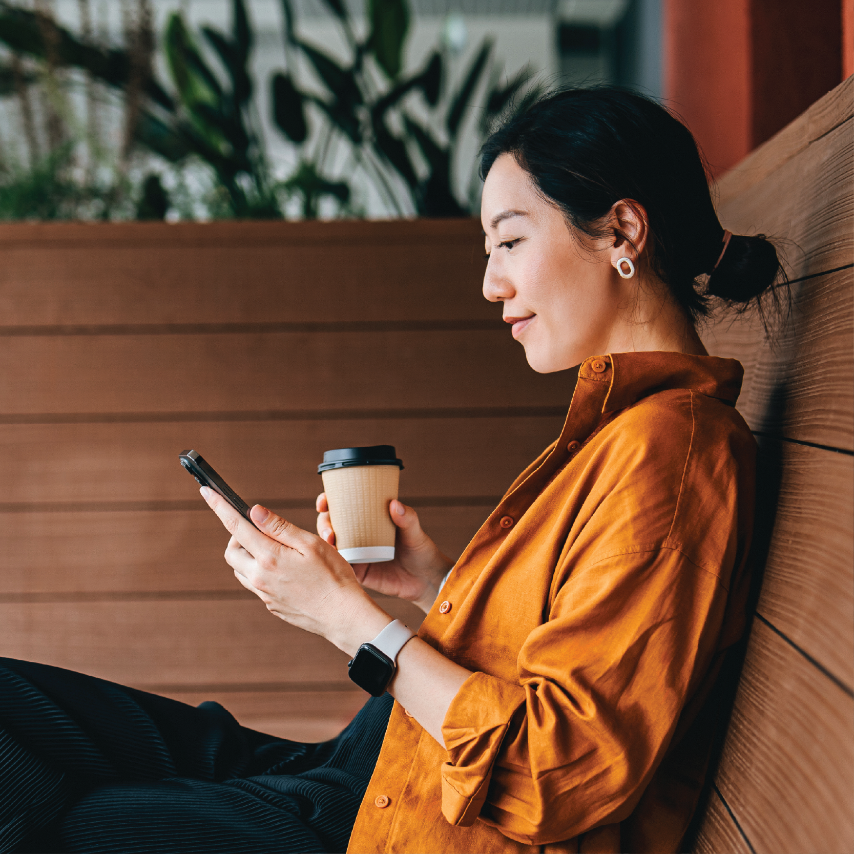 Woman using cellphone.